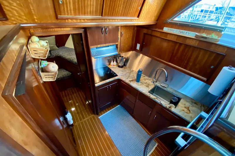 Slide: The Image of Bosch built-in microwave oven with digital display in a Hatteras 43 Double Cabin yacht kitchen. - 52