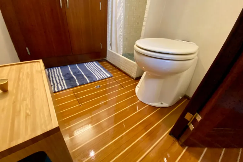 Slide: The Image of Shower area in 1971 Hatteras 43 Double Cabin yacht with mosaic tiles and marble sink. - 60