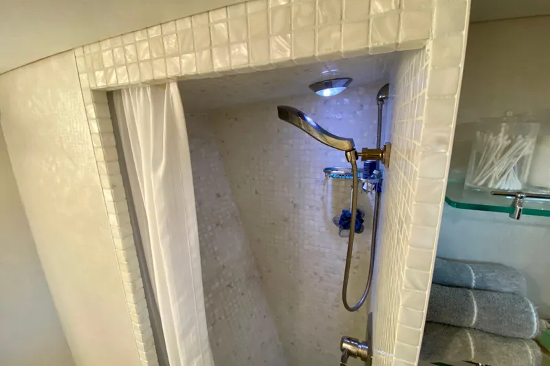 Slide: The Image of Shower with blue hexagonal tiles in 1971 Hatteras 43 Double Cabin yacht. - 61
