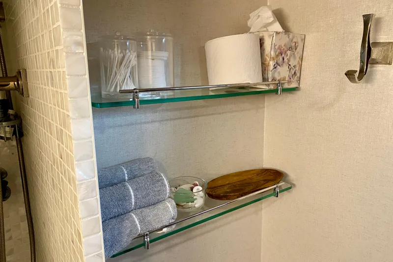 Slide: The Image of 1971 Hatteras 43 Double Cabin interior with wood finish and patterned cushions. - 64