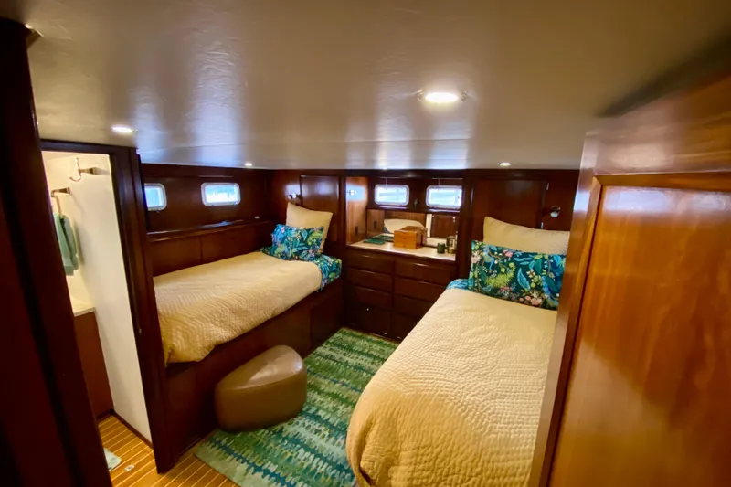 Slide: The Image of Polished wooden floor inside a 1971 Hatteras 43 Double Cabin yacht. - 77