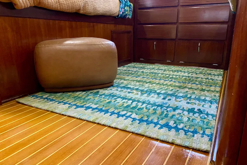 Slide: The Image of Interior of 1971 Hatteras 43 Double Cabin with wooden closets and cozy decor. - 80