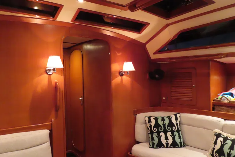 Slide: The Image of Luxurious interior of a 1998 Hylas 54' yacht with elegant wood paneling. - 19