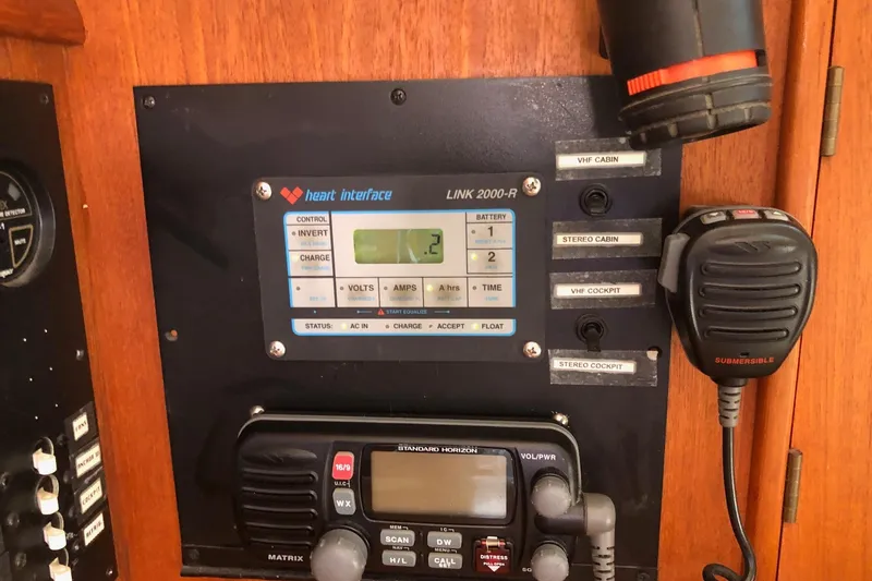 Slide: The Image of Control panel on 1997 Island Packet 350 sailboat with radio and battery monitor. - 12