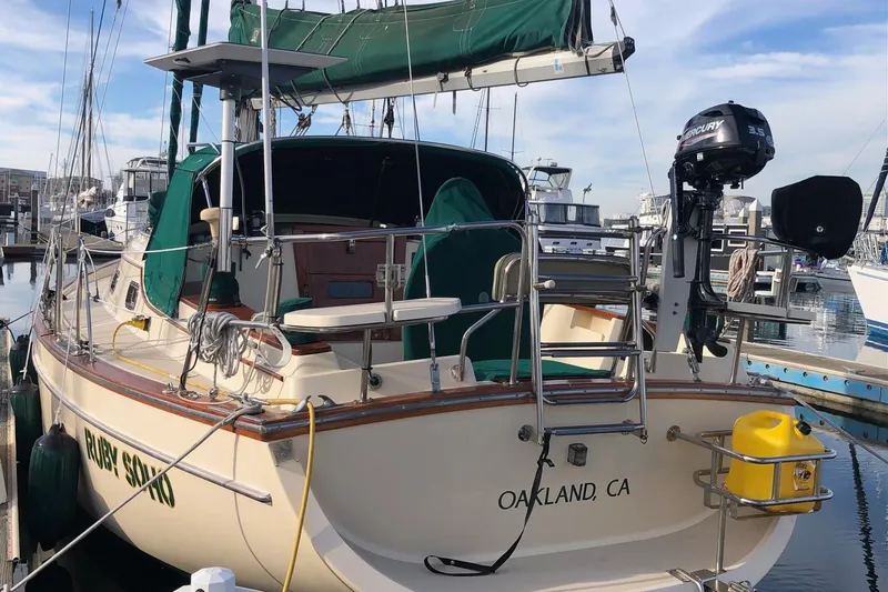 Slide: The Image of 1997 Island Packet 350 sailboat docked in Alameda, CA marina. - 26