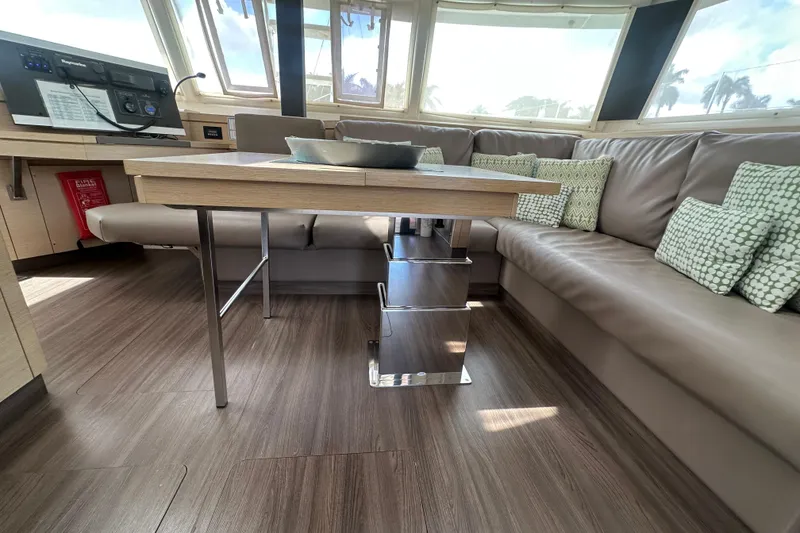 Slide: The Image of Luxurious interior of 2019 Fountaine Pajot 47 catamaran with modern seating and table. - 26