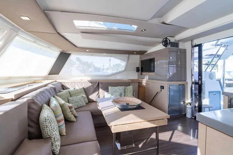 Slide: The Image of Luxurious interior of 2019 Fountaine Pajot 47 yacht with modern seating and decor. - 27