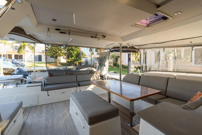 Slide: The Image of Spacious interior of 2019 Fountaine Pajot 47 catamaran with comfortable seating and table. - 37