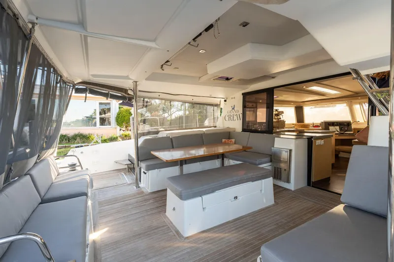 Slide: The Image of Luxurious interior of 2019 Fountaine Pajot 47 catamaran with spacious seating and dining area. - 38