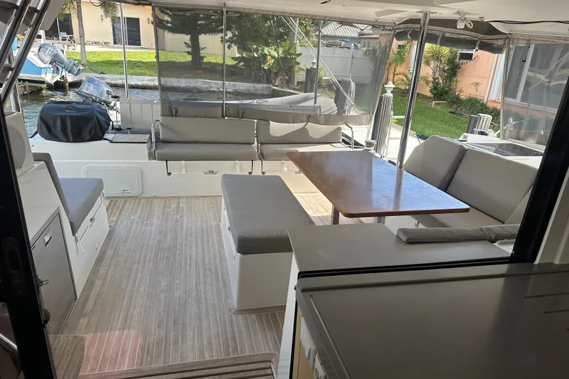 Slide: The Image of Spacious 2019 Fountaine Pajot 47 yacht interior with seating and dining area. - 42