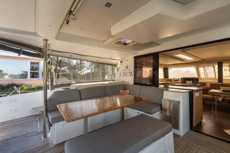 Slide: The Image of Luxurious interior of 2019 Fountaine Pajot 47 catamaran with spacious seating and dining area. - 43