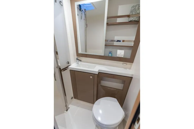 Slide: The Image of Modern bathroom in 2019 Fountaine Pajot 47 yacht with sleek fixtures and storage. - 52