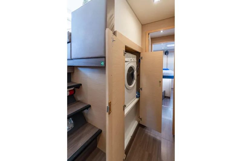 Slide: The Image of Laundry area with washer in 2019 Fountaine Pajot 47 yacht interior. - 54