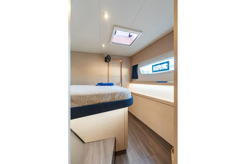 Slide: The Image of Interior cabin of 2019 Fountaine Pajot 47 yacht, featuring modern design and natural lighting. - 55