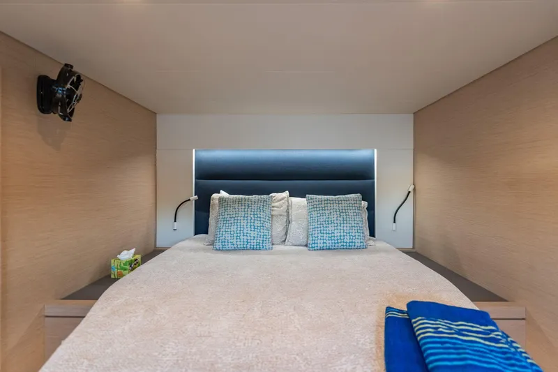 Slide: The Image of Cozy bedroom interior of 2019 Fountaine Pajot 47 yacht with modern design elements. - 59