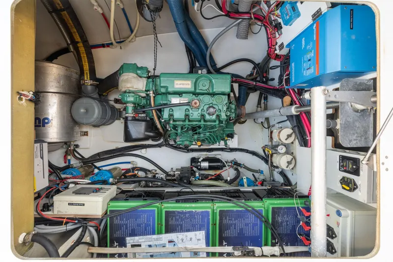 Slide: The Image of Engine room of 2019 Fountaine Pajot 47 catamaran with mechanical and electrical components. - 74