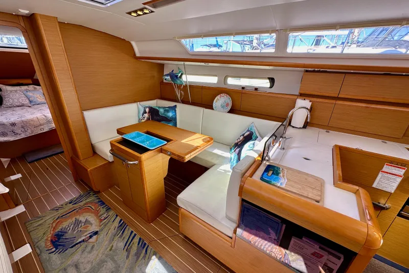 Slide: The Image of Interior of 2015 Jeanneau Sun Odyssey 409 sailboat with cozy seating and modern design. - 61