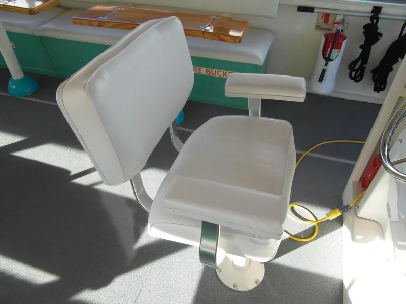 Slide: The Image of White captain's chair on a 2005 Trident 40 Passenger Tour Boat. - 14