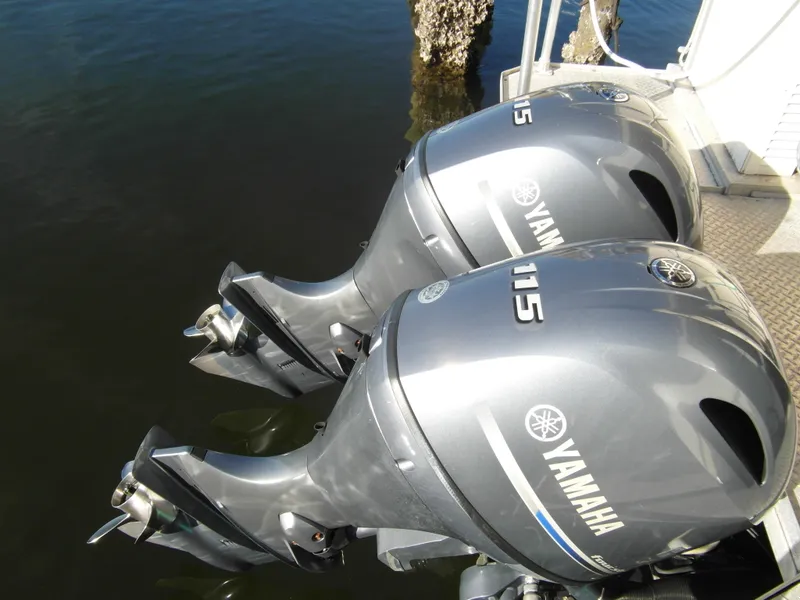 Slide: The Image of Twin Yamaha outboard motors on a 2005 Trident 40 Passenger Tour Boat. - 23