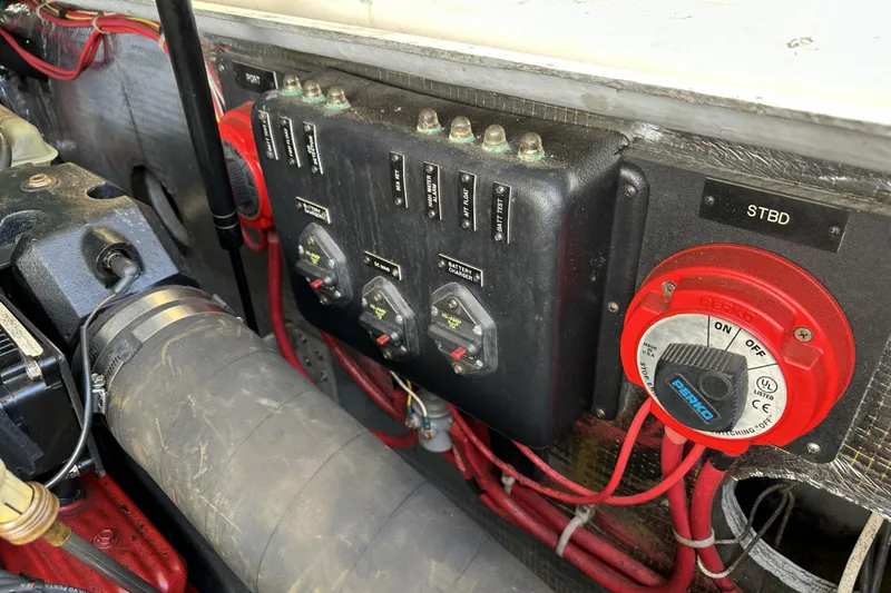 Slide: The Image of Control panel and wiring in a 2005 Albemarle 280 Express Fisherman boat. - 14