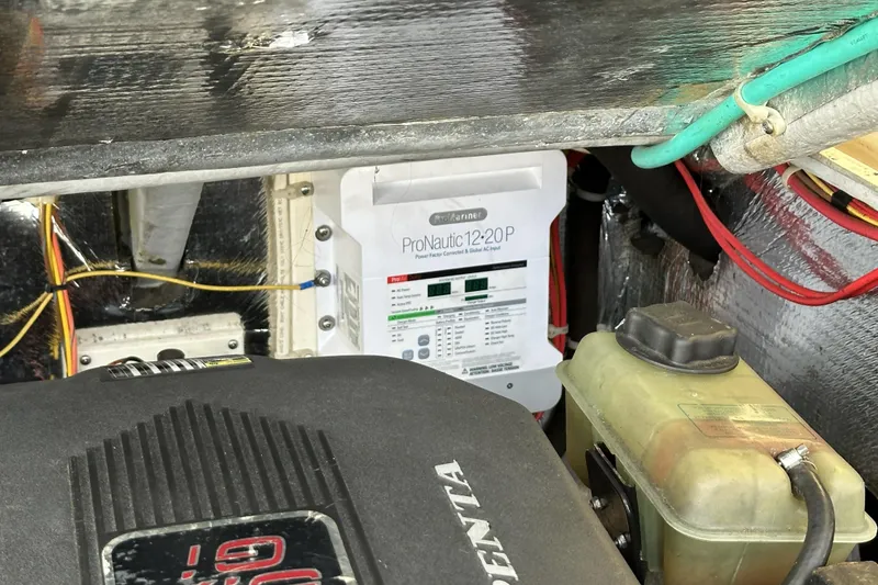 Slide: The Image of Engine compartment of 2005 Albemarle 280 Express Fisherman with ProNautic 12-20P charger. - 16