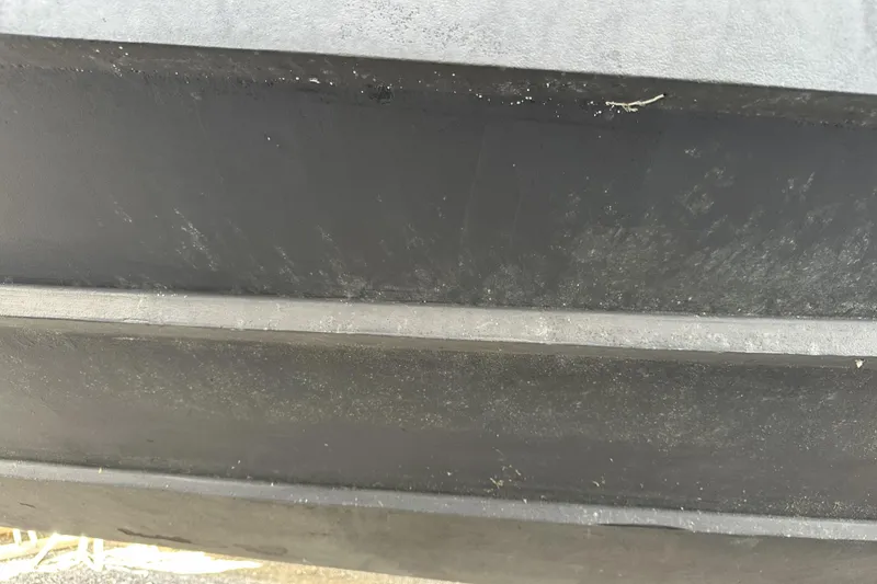 Slide: The Image of Close-up of the hull of a 2005 Albemarle 280 Express Fisherman boat. - 19