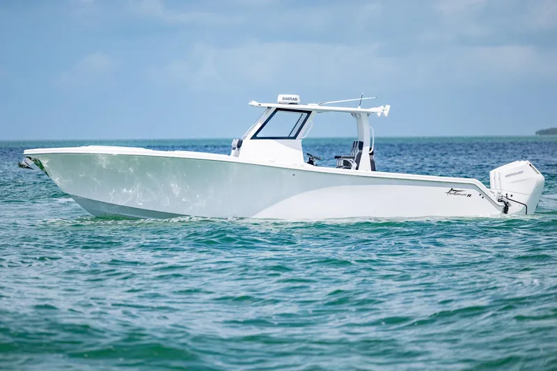 Slide: The Image of Streamline R 35 boat, 2025 model, cruising on clear blue ocean waters. - 0