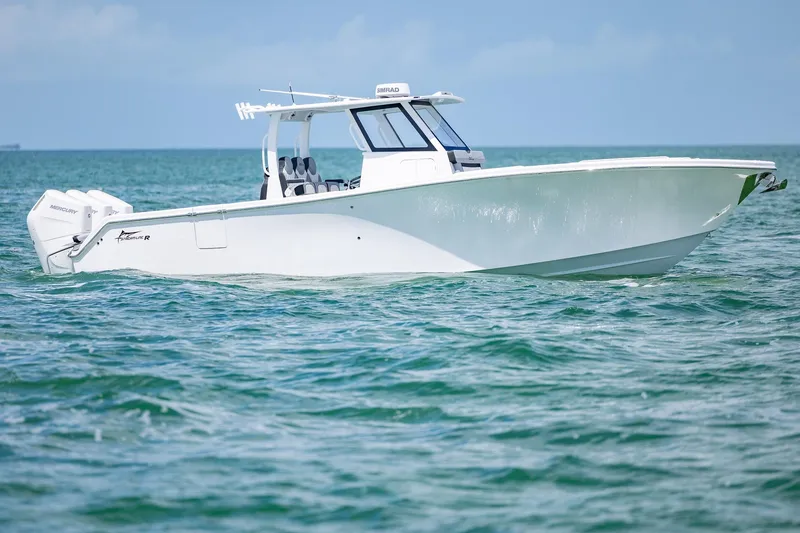 Slide: The Image of 2025 Streamline R 35 boat cruising on calm ocean waters. - 1