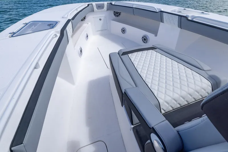 Slide: The Image of Luxurious interior of 2025 Streamline R 35 boat with quilted seating and sleek design. - 16