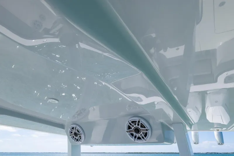Slide: The Image of Underneath view of 2025 Streamline R 35 boat with speakers and glossy finish. - 20