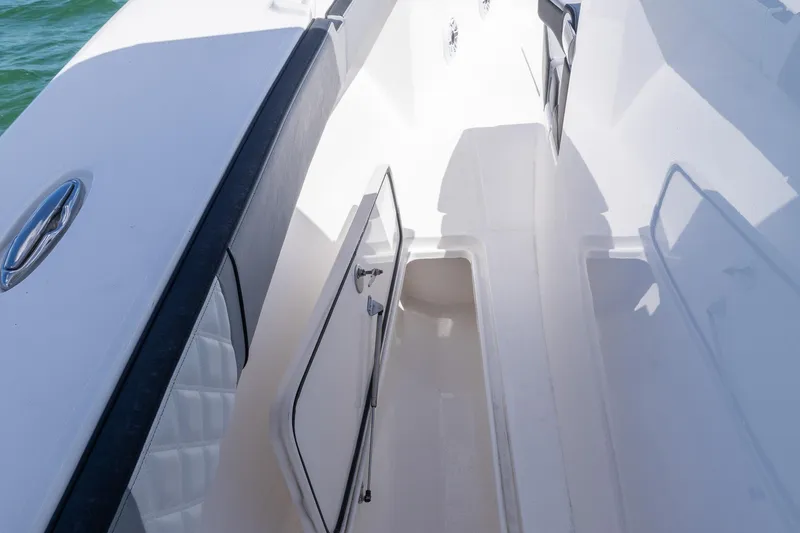 Slide: The Image of Streamline R 35 boat interior, 2025 model, featuring sleek white design and modern fittings. - 24