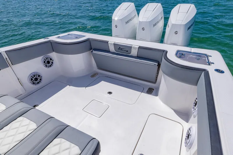 Slide: The Image of Luxurious 2025 Streamline R 35 boat interior with quad Mercury engines on open water. - 26