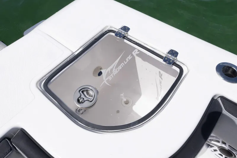 Slide: The Image of Hinged compartment on 2025 Streamline R 35 boat, featuring sleek design and secure latch. - 28