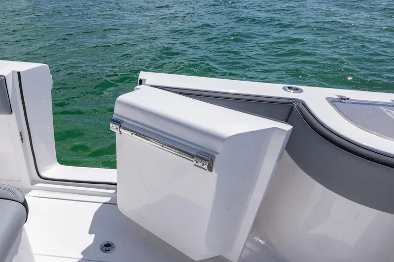 Slide: The Image of Streamline R 35 boat deck detail with open hatch, 2025 model, on calm water. - 30