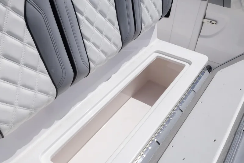 Slide: The Image of Streamline R 35 2025 boat seat with storage compartment, featuring quilted gray upholstery. - 31