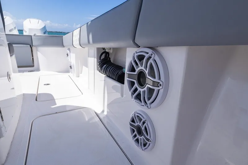 Slide: The Image of 2025 Streamline R 35 boat interior with speakers and seating, showcasing modern design. - 34