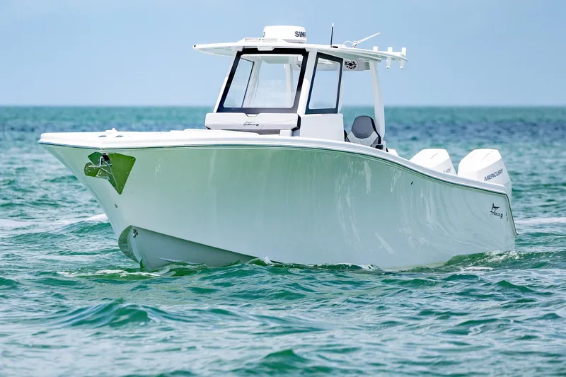 Slide: The Image of 2025 Streamline R 35 boat cruising on open water, showcasing sleek design and modern features. - 5