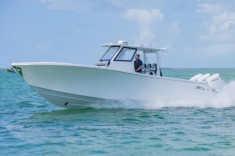 Slide: The Image of 2025 Streamline R 35 boat cruising on clear blue water. - 7