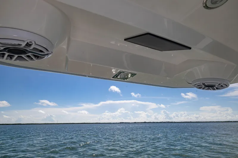 Slide: The Image of 2024 Deep Impact 399 Sport boat speakers with ocean view. - 54