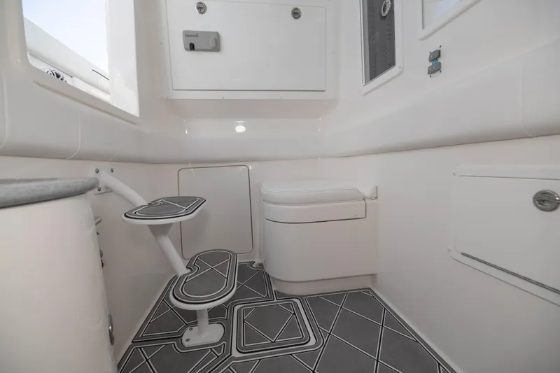 Slide: The Image of 2024 Deep Impact 399 Sport boat interior with modern bathroom design. - 72