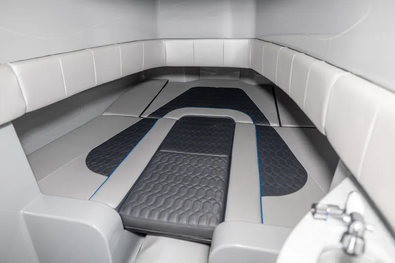 Slide: The Image of 2023 Deep Impact 399 Sport cabin interior with sleek, modern design and comfortable seating. - 23