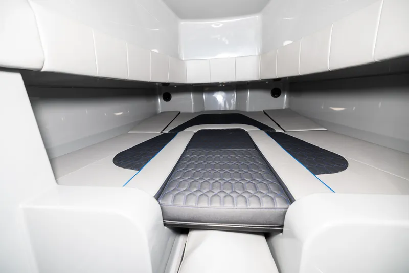 Slide: The Image of 2023 Deep Impact 399 Sport cabin interior with sleek, modern design and comfortable seating. - 24