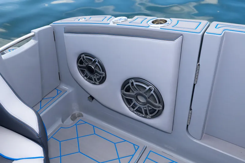 Slide: The Image of Interior of 2023 Deep Impact 399 Sport boat with speakers and modern design. - 32