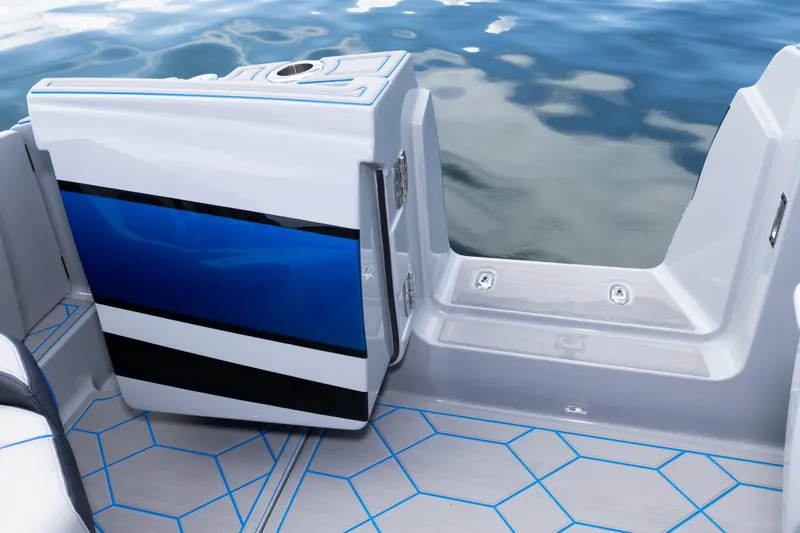 Slide: The Image of 2023 Deep Impact 399 Sport boat with sleek design and modern features on water. - 33