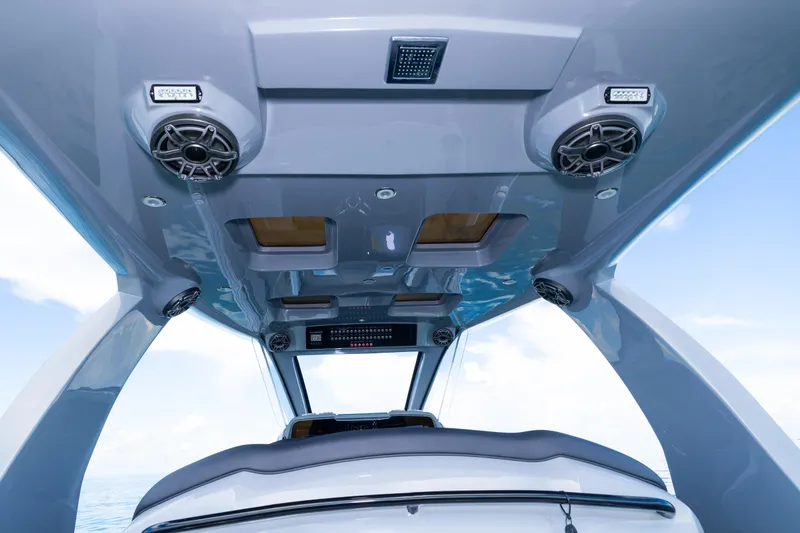 Slide: The Image of Interior view of 2023 Deep Impact 399 Sport boat with speakers and skylights. - 37