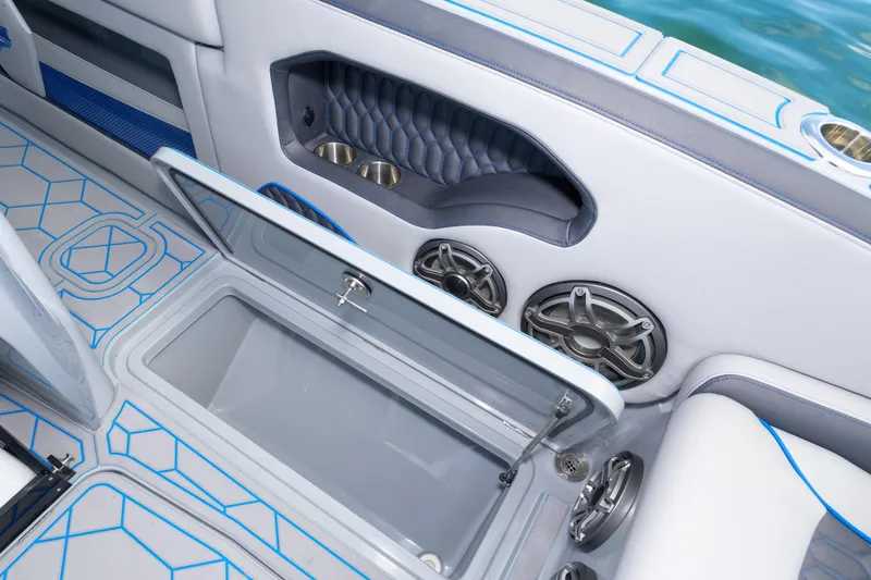 Slide: The Image of Interior of 2023 Deep Impact 399 Sport boat with storage and speakers. - 39