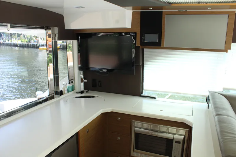 Slide: The Image of Interior of 2014 Cruisers Yachts 45 Cantius with modern kitchen. - 18