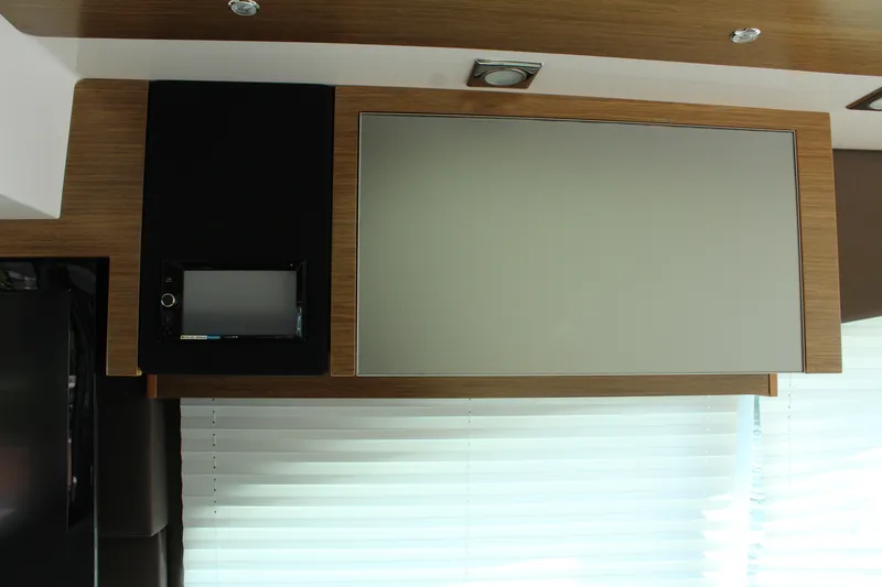 Slide: The Image of Interior of 2014 Cruisers Yachts 45 Cantius with wood paneling. - 22
