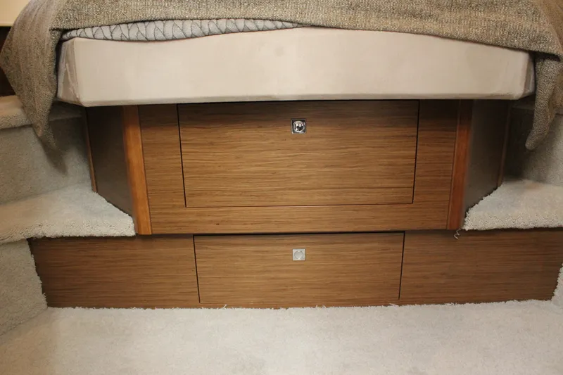Slide: The Image of Wooden drawers under bed in 2014 Cruisers Yachts 45 Cantius. - 36