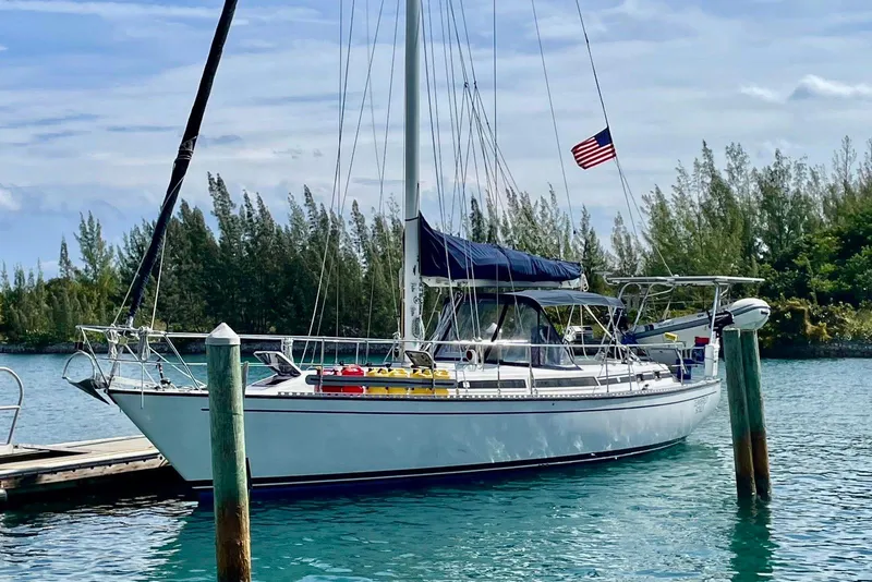 The Image of 1986 Gulfstar Hirsch 45 sailboat "Tempered Souls" on dry dock, with blue hull and ladder access. - 0